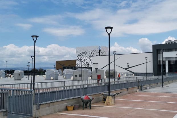 Outdoor LED Post Lights In A Parking Lot In Italy